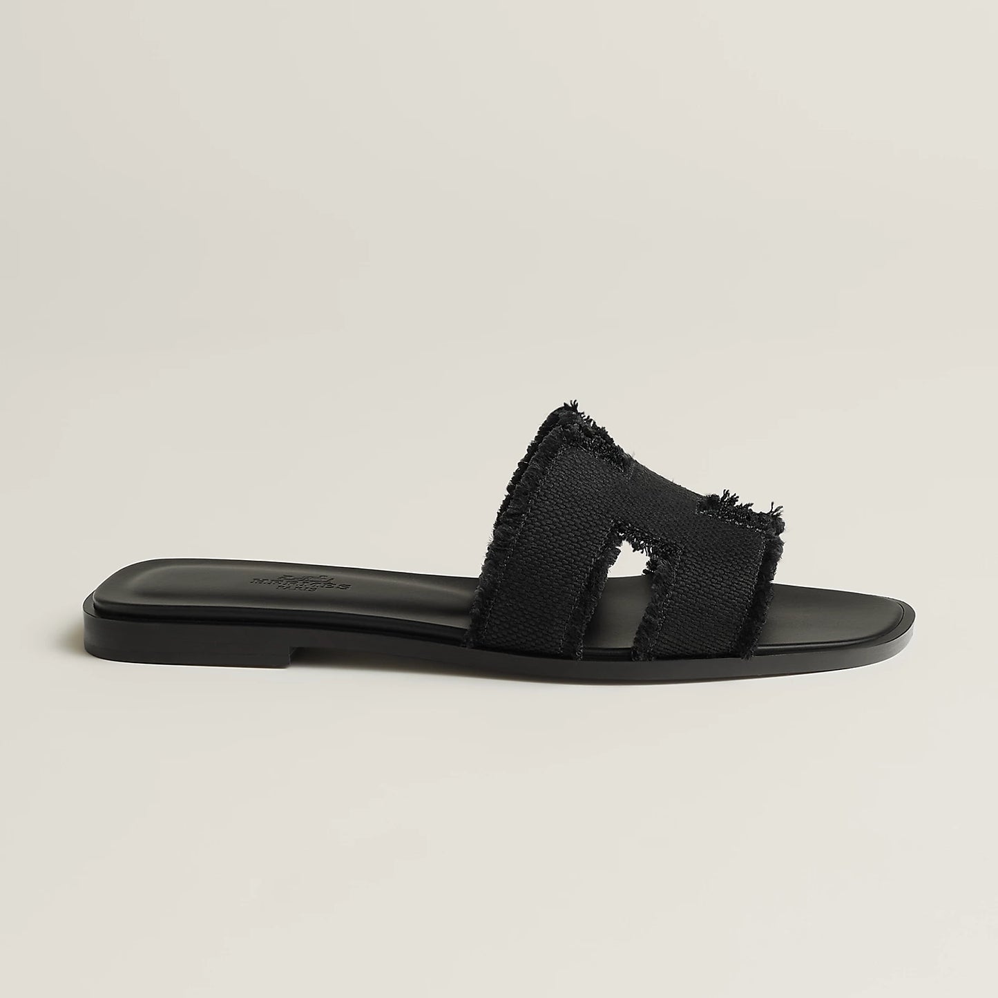 Hermès - Sandales Oran Noir en toile H effrangée