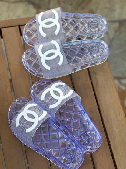 Chanel - Claquettes avec logo Chanel Transparente