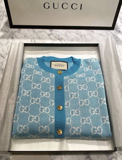 Louis Vuitton - Pull en laine à bouton doré Bleu