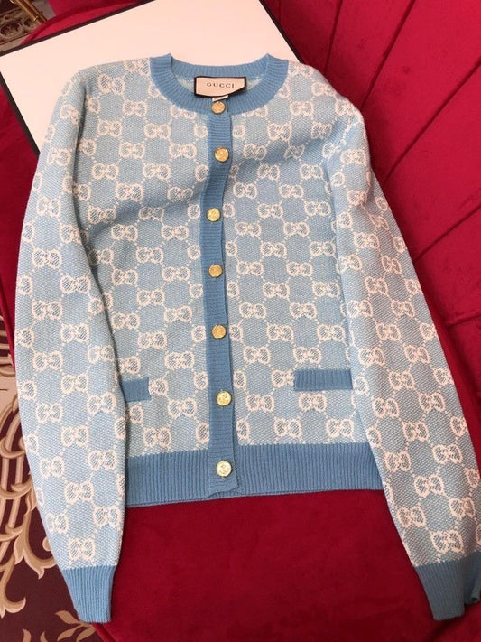 Louis Vuitton - Pull en laine à bouton doré Bleu