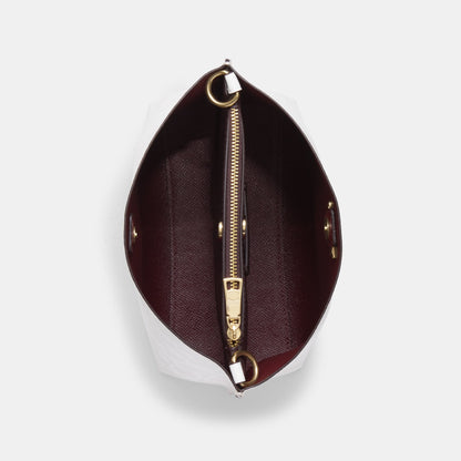 Mollie Bucket Bag 22 In Signature Canvas